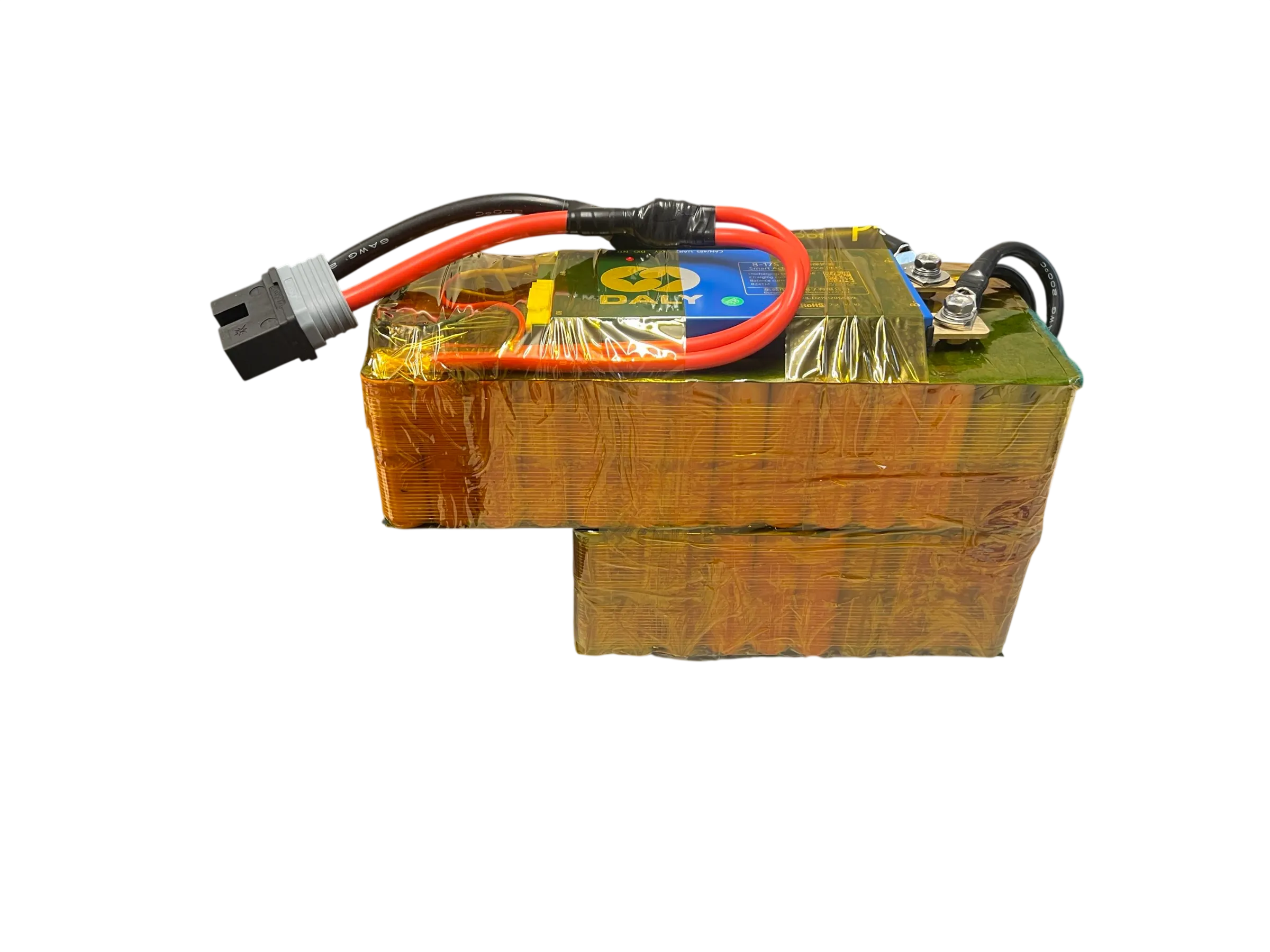 The finished pack out of its box, wrapped in kapton with a Daly battery management system and main power leads fitted